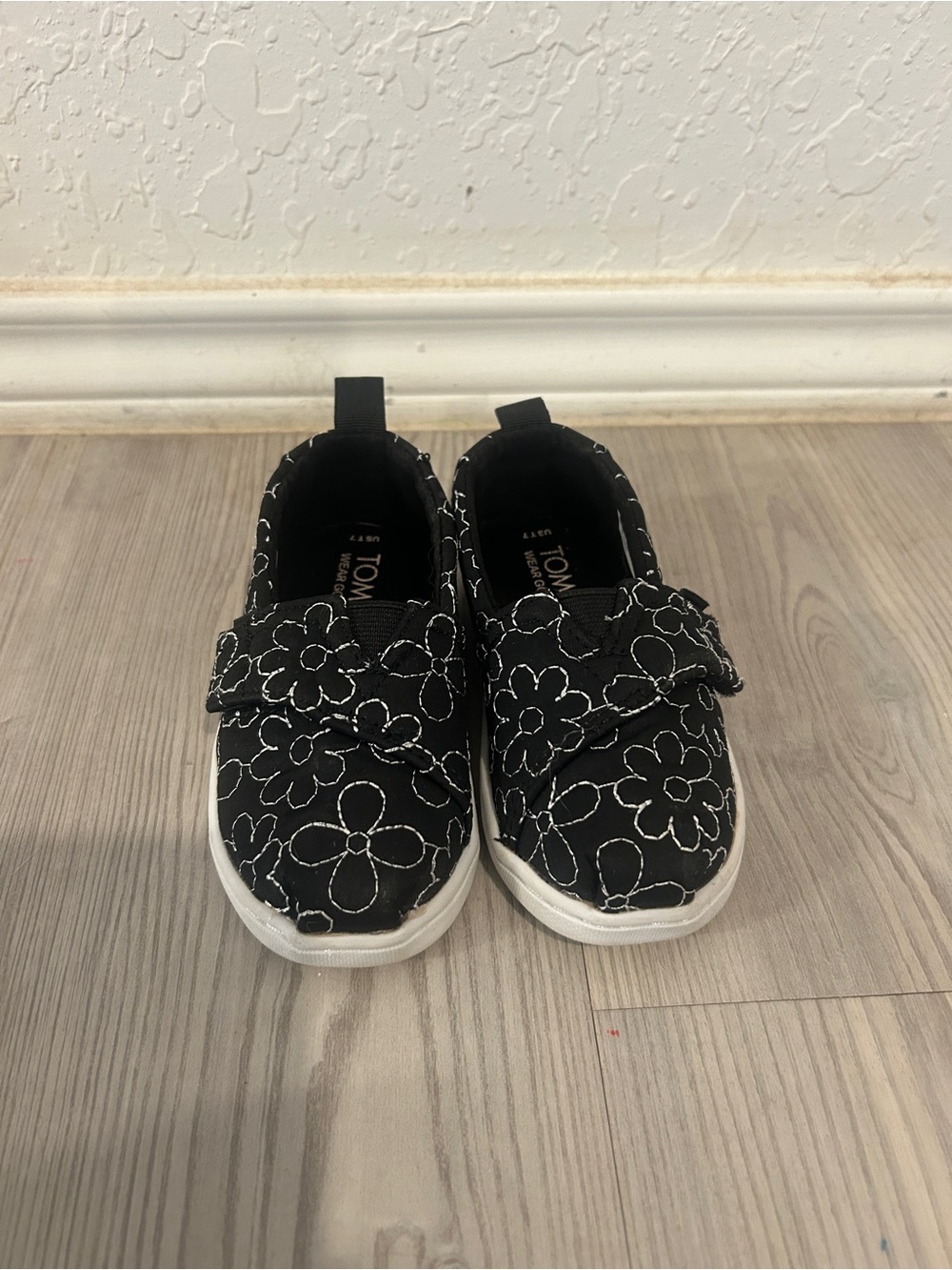 TOMS Kids Black Floral Puffy Slip-Ons